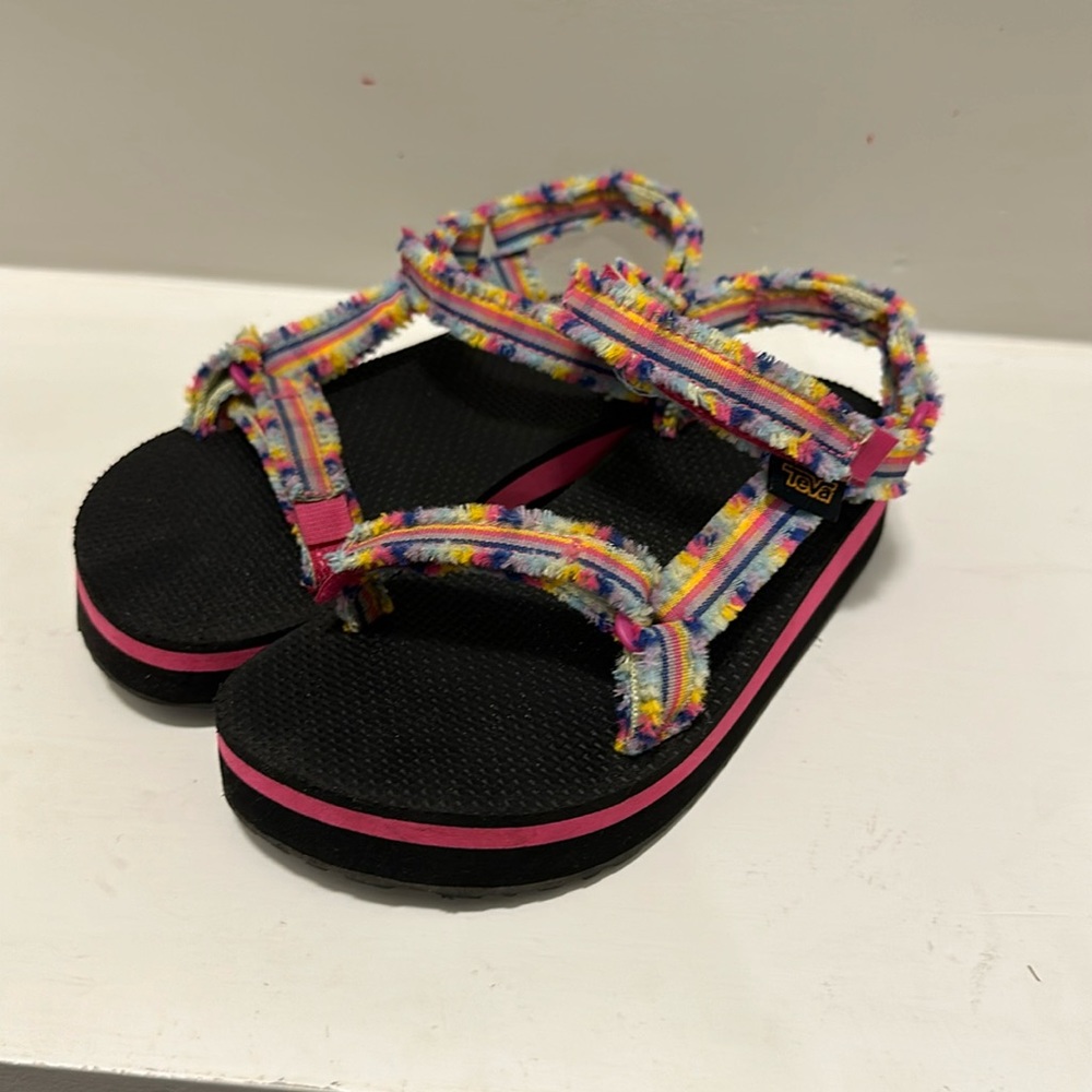 Rainbow colored Teva shoes. Barely worn